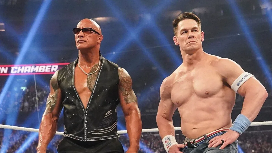 John Cena and Dwayne Johnson posing together during their WWE rivalry